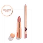 An open nude pink lipstick in a gold-coloured tube and lip liner pencil in a nude pink shade.