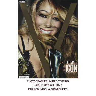 V Magazine Cover featuring Mariah Carey wearing smokey eye makeup with bold red lips and in a low-cut black gown with spaghetti straps. 