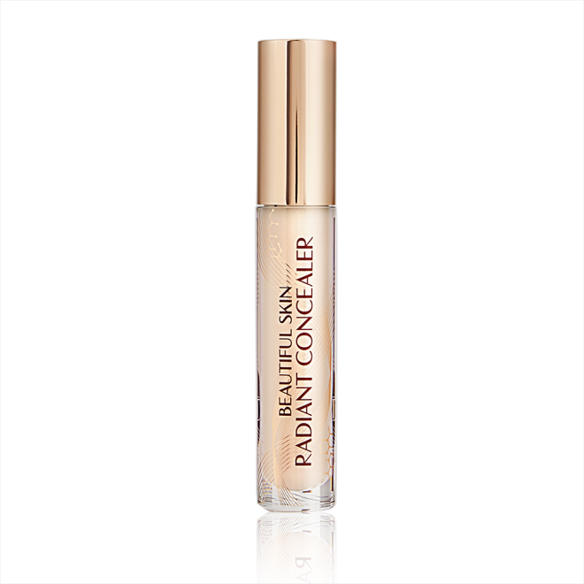 Radiant concealer in a glass tube with a gold-coloured lid with text on the tube that reads, 'Beautiful Skin Concealer'