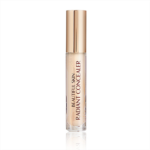 Radiant concealer in a glass tube with a gold-coloured lid with text on the tube that reads, 'Beautiful Skin Concealer'