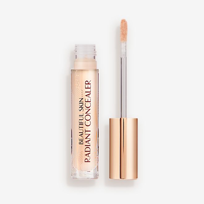 Beautiful Skin concealer in 2.5 closed Radiant concealer in a glass tube with a gold-coloured lid with text on the tube that reads, 'Beautiful Skin Concealer'