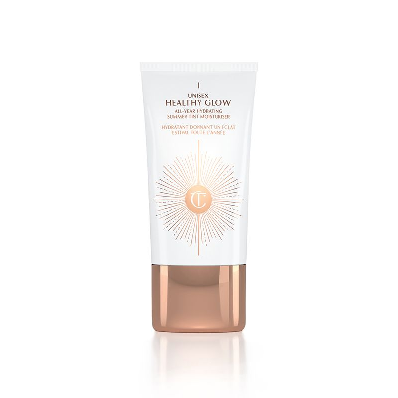 A hydrating tinted moisturizer in a white and rose-gold coloured bottle with a rose-gold coloured lid. 