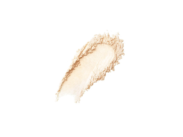 Swatch of a light-yellow loose powder for tan to medium skin. 