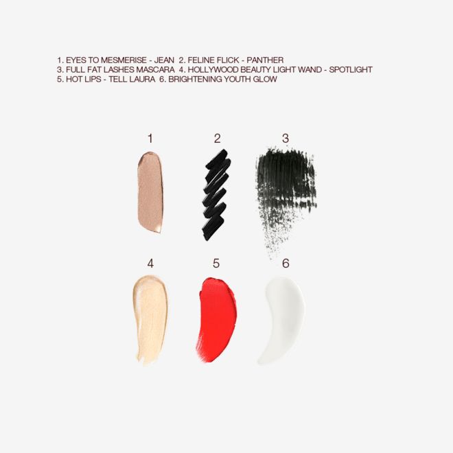 The Radiant Beauty kit swatches Swatches of a cream eyeshadow in fawn, black eyeliner, black mascara, liquid highlighter in champagne, lipstick in bright red, and primer in luminous white.