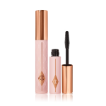 Two identical mascara, one full-size and the other mini in light pink coloured tubes with gold-coloured lids.