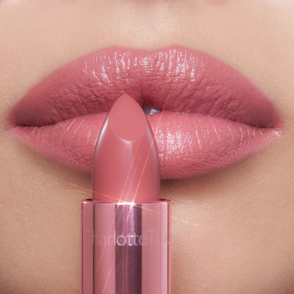 Close up of lips wearing a trending frosted lips lipstick look using Icon Baby