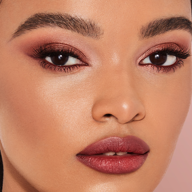 Model wearing a red 4th of july makeup look