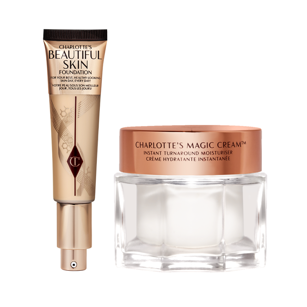 An open foundation tube in sleek gold packaging with a pump dispenser along with pearly-white cream in a glass jar with a gold-coloured lid. 