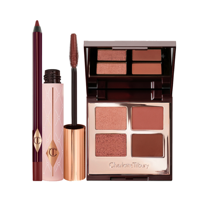 A berry-brown eyeliner, dark brown mascara, and quad eyeshadow palette with a mirrored-lid in shimmery and matte shades of brown and gold. 