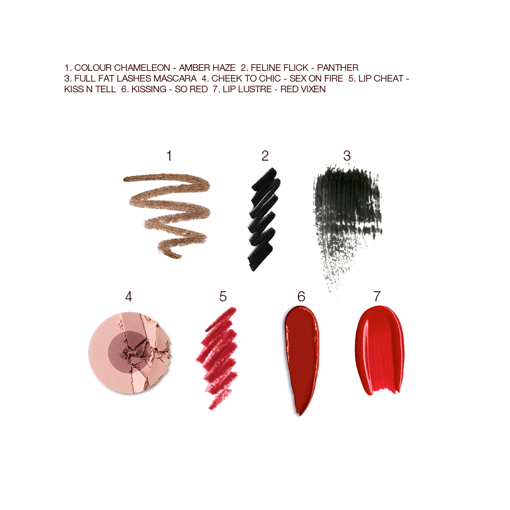Swatches of eyeshadow in bronze, black eyeliner, black mascara, two-tone blush in mauve and pink-brown, lip liner in bright red, lipstick in maroon, and lip gloss in bright red. 