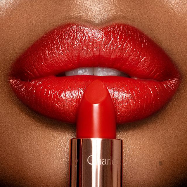 CLose up of So Red satin lipstick for deep skin
