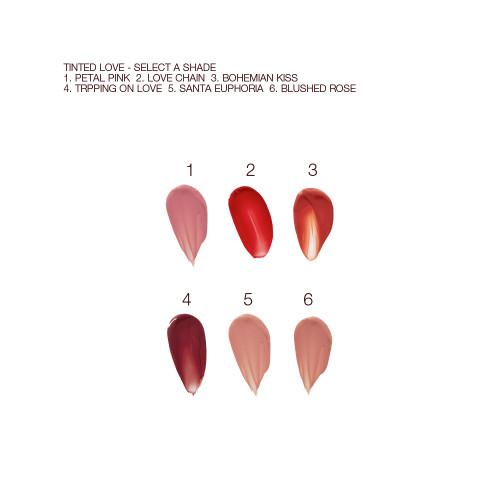 Swatches of six lip and cheek tints in shades of pink, red, brown, peach and purple. 