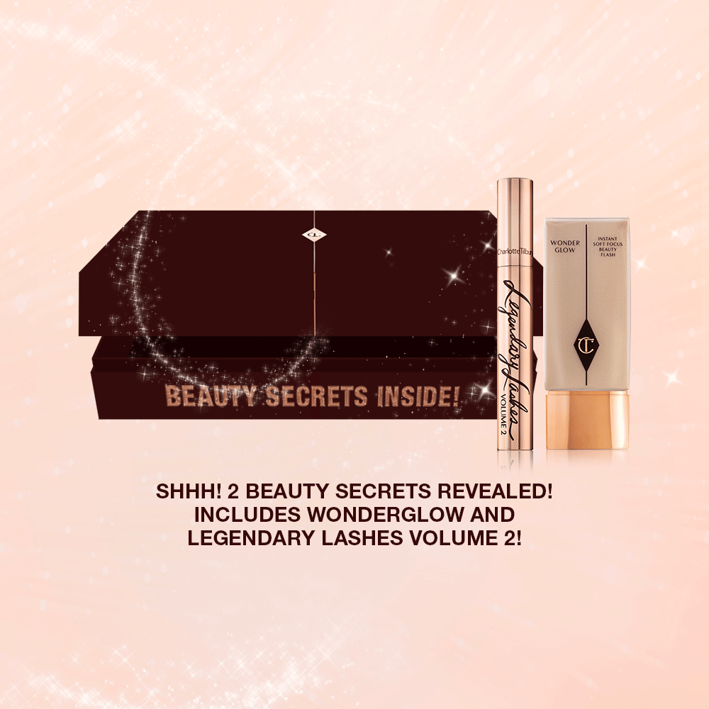 GIF with a mascara, foundation, and a dark crimson-coloured box, along with the text, 'Shhh! 2 beauty secret revealed! Includes wonderglow and legendary lashes volume 2!'