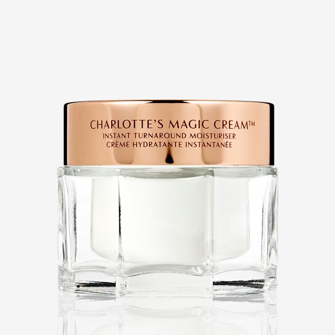 Magic Cream Lunar Year closed Thick, pearly-white cream in a glass jar with a gold-coloured lid with red a red tiger-print on it