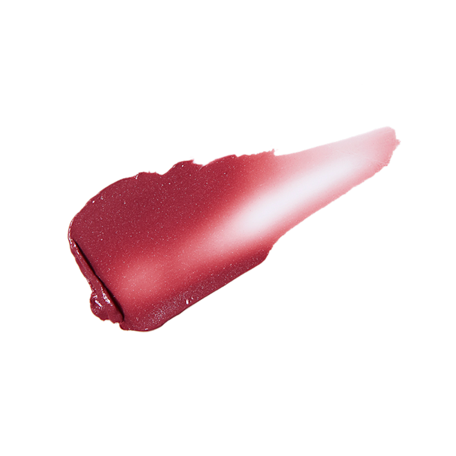 Pillow Talk Lip and Cheek Glow in Colour of Passion swatch Swatch of a cheek and eye cream in a dark berry-pink shade.