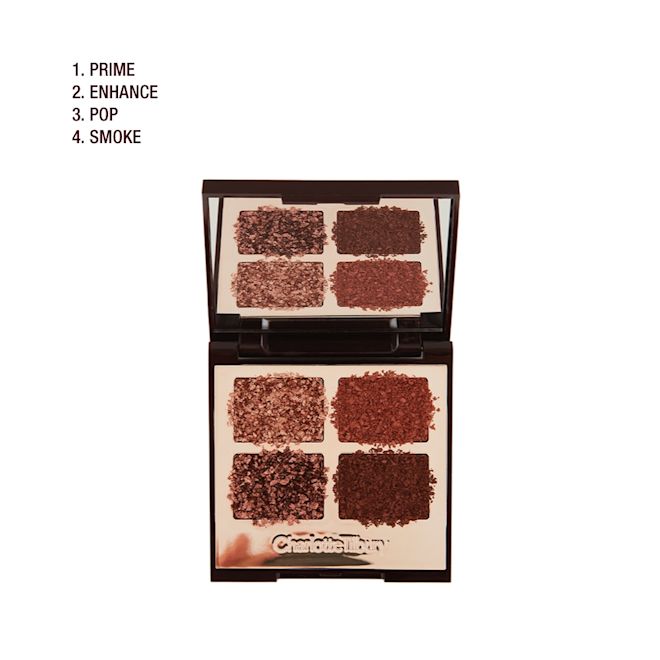 Luxury Eye Palette in Pillow Talk Dreams open An open quad eyeshadow palette with metallic and matte shades of pearlescent rose gold, dusky rose, berry brown and rose-bud pink.
