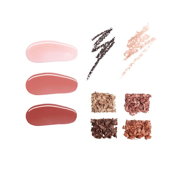 Eyes Lips of a Star Kit swatches Swatches of three lip glosses in light pink, nude berry-pink, and brown pink, duo eyeliner pencils in black and shimmery beige, and quad eyeshadow palette in shades of brown, olive, and terracotta.