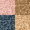 Swatches of a quad eyeshadow palette with shimmery eyeshadows in rose gold, teal, honey-gold, and bright gold colours. 