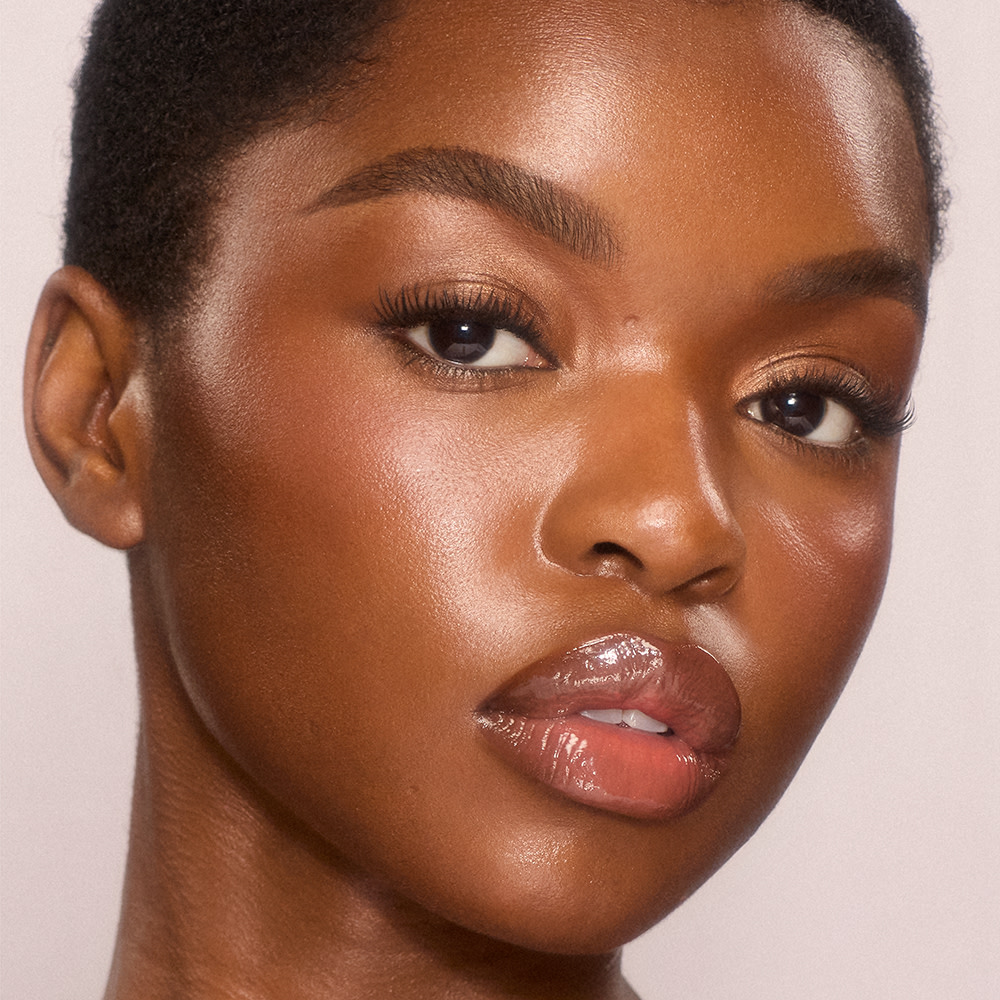 Charlotte Tilbury Unreal Skin Sheer Glow Tint Hydrating Foundation Stick - 13 Deep