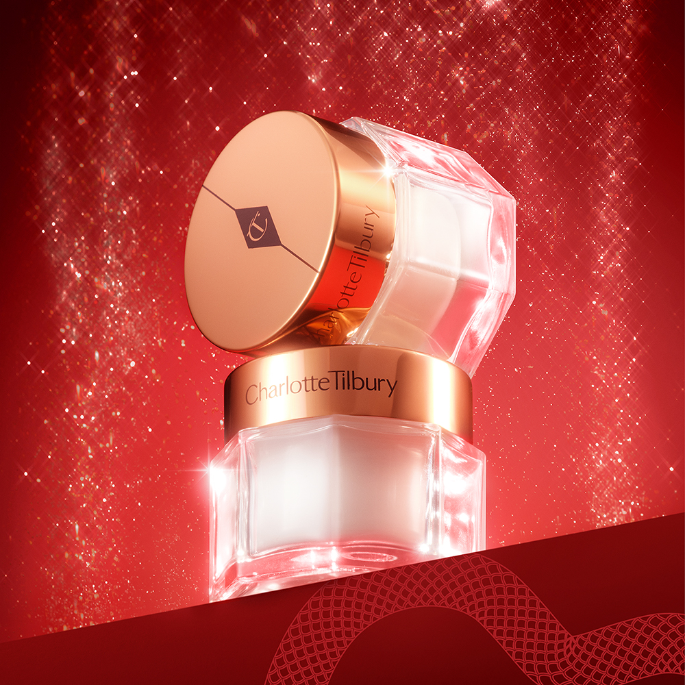 Charlotte's Magic Cream with a lucky new year gift red backdrop