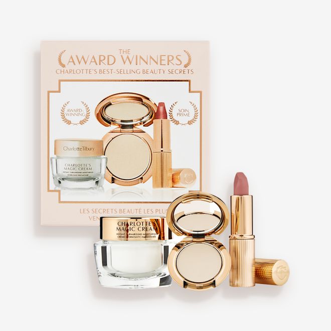 Makeup Starter Kit in Fair displayed Pearly-white face cream in a glass jar with a gold-coloured lid, pressed powder compact in a fair shade, and a dusky pink lipstick in a sleek gold-coloured tube.