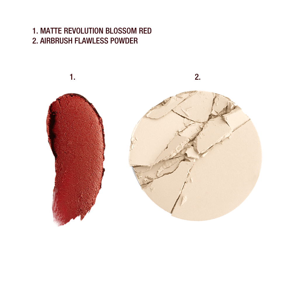 Swatch of a matte burnt-orange red lipstick and setting powder in a light beige shade.