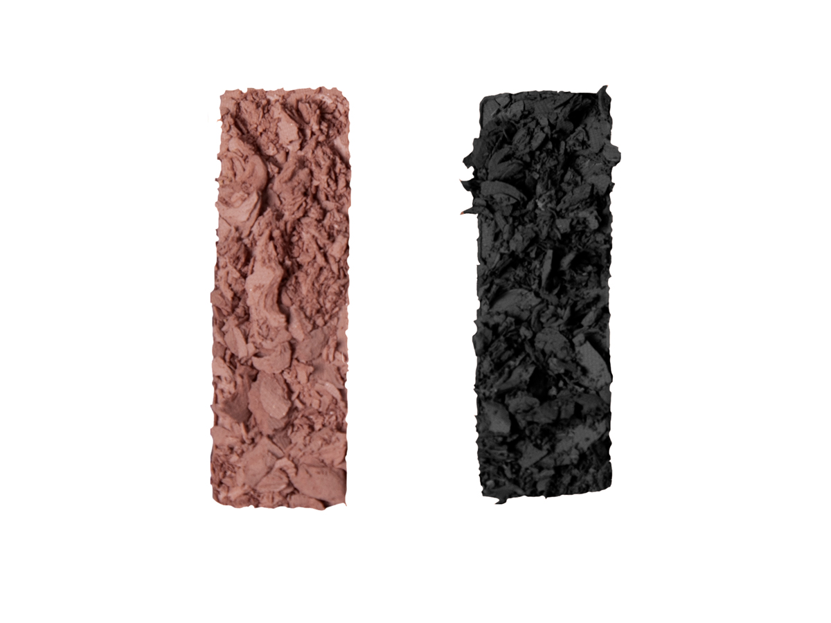 Swatches of two eyeshadows to add smokiness in dark brown and black colours.