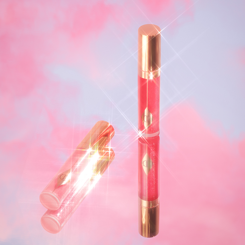 Charlotte's Jewel Lips lip gloss in Pinkgasm and Pinkgasm Sunset for pink glossy lips
