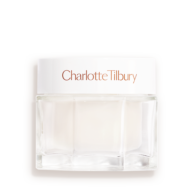 Magic Water Cream Closed Clear jar with a white lid and white cream inside.