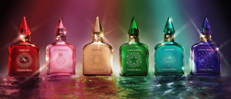 6 Charlotte Tilbury Fragrances in a row showing red, pink, gold, green, blue and purple perfume bottles
