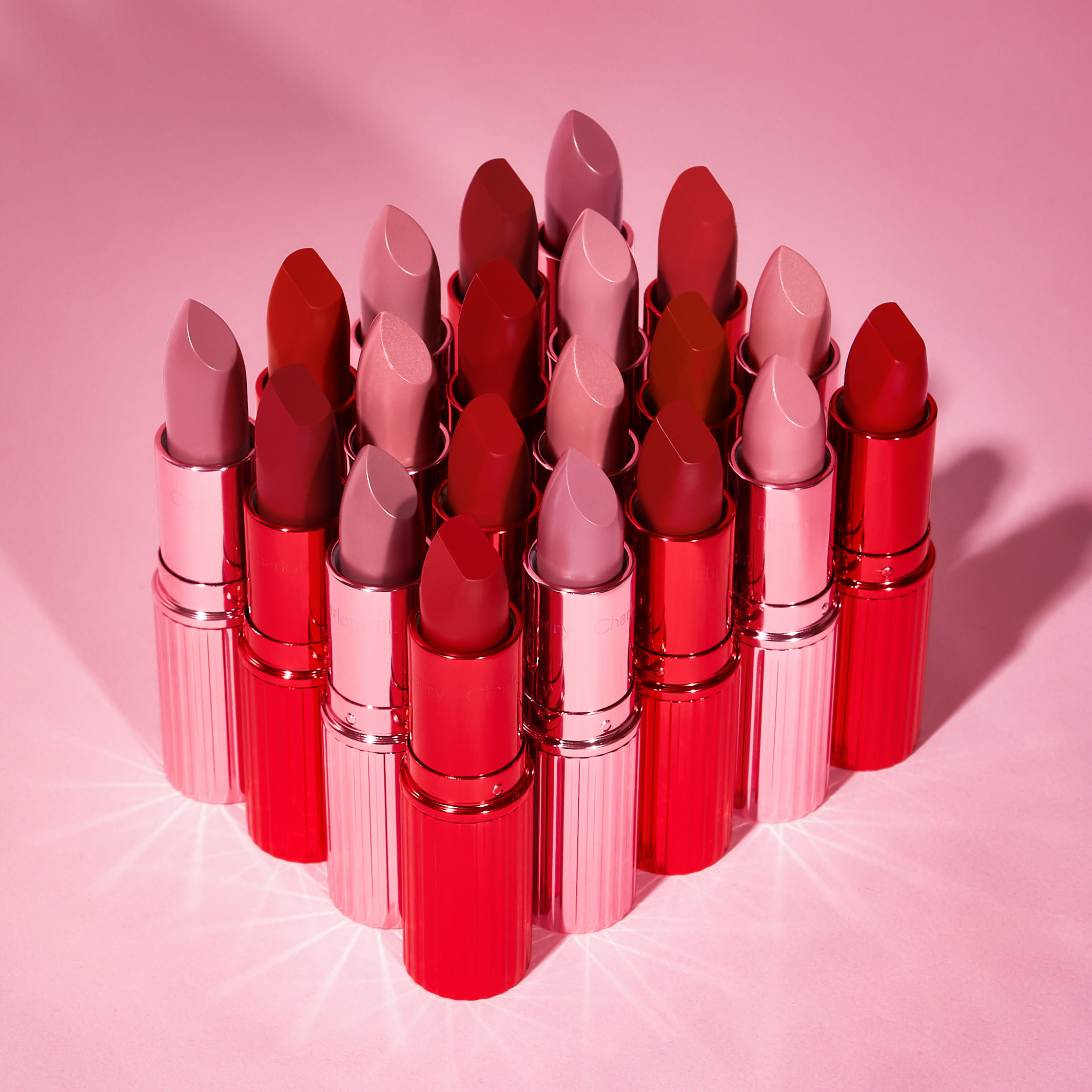 Collection of Charlotte Tilbury lipsticks in a range of pink and red shades to choose from