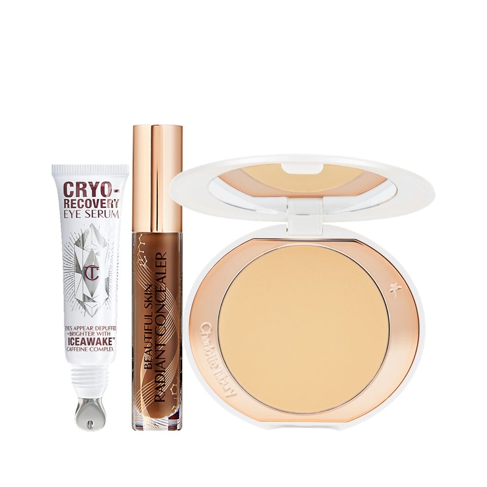 Eye serum in a white-coloured tube, a brightening, setting powder compacts in banana yellow with white packaging, and a concealer in a glass tube and gold-coloured lid.