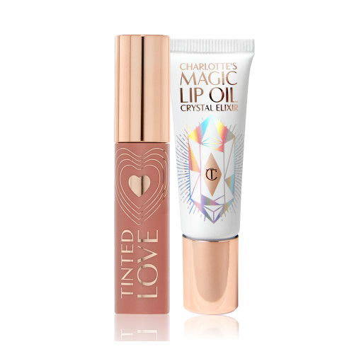 Lip and cheek tint in a brown-pink shade with a golden-coloured lid and lip oil in a white-coloured tube with a gold-coloured tube. 