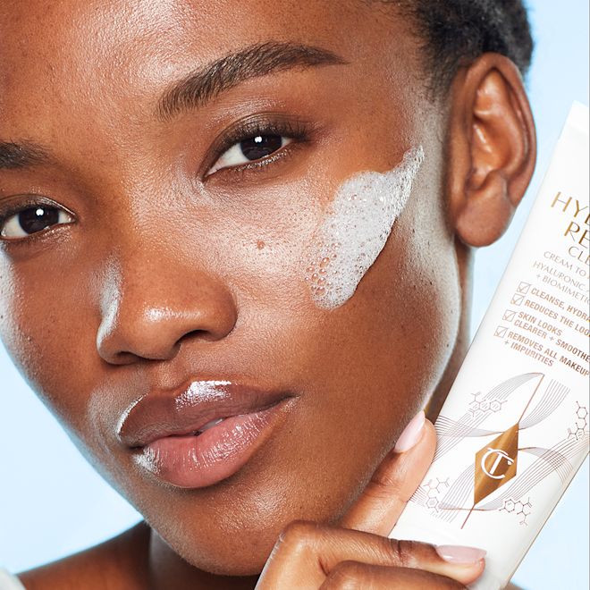 Mae skincare for oily skin Mae applying Charlotte's Magic Hydration Revival Cleanser in their skincare routine for oily skin