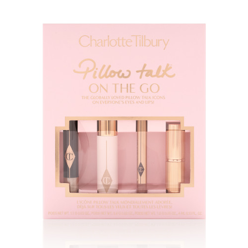 A packed makeup kit that includes an eyeshadow pencil in a rose gold shade, mascara, lip liner pencil in nude pink, and lipstick in a nude pink shade.