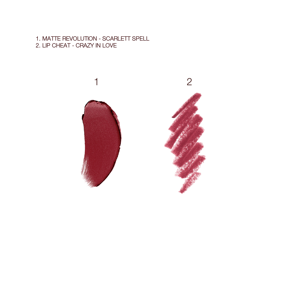 Swatches of matte lipstick in a winter berry shade and lip liner pencil in a berry rose pink shade.