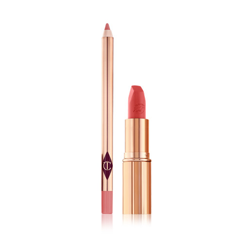 An open lip liner pencil in a soft tea pink colour with an open lipstick in a coral-pink shade in a gold-coloured tube.