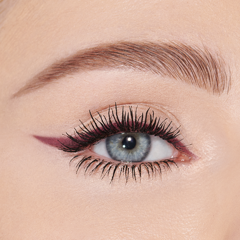 Pillow Talk Push Up Eye Kit on fair skintone model