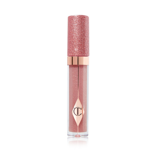 A nude-pink lip gloss in a glass tube with a shimmery rose gold-coloured lid. 
