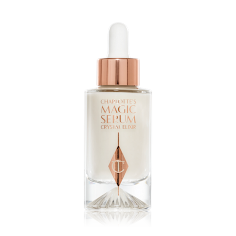 A luminous, ivory-coloured facial serum in a glass bottle with a white and gold-coloured dropper lid, 