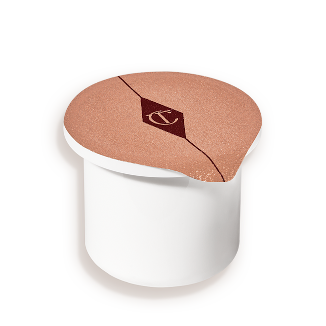 Magic Cream Refill closed A small, face cream refill in a white-coloured pot with an easy-to-remove seal.
