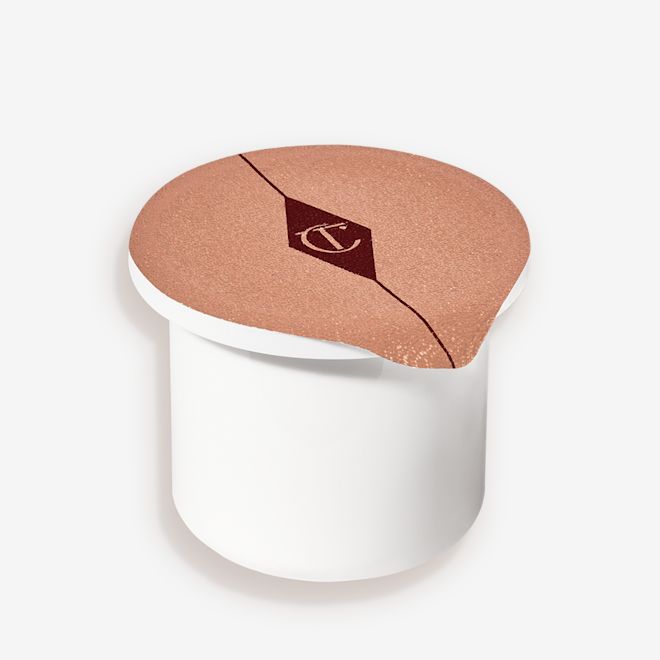 Magic Cream Refill closed A small, face cream refill in a white-coloured pot with an easy-to-remove seal.