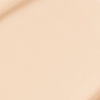 Close-up swatch of a skin-like, glowy foundation in a light white-beige shade.