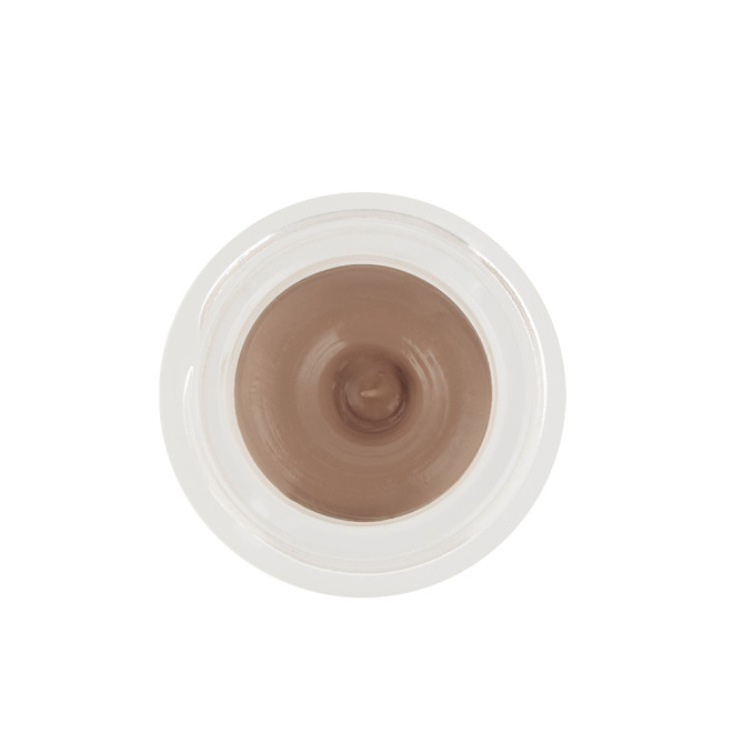 An open frosted glass pot with a cream eyeshadow in a dark beige shade.