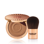 An open cream bronzer compact with gold-coloured packaging with a bronzer brush with soft,d ark-brown-coloured bristles and a golden-coloured handle.