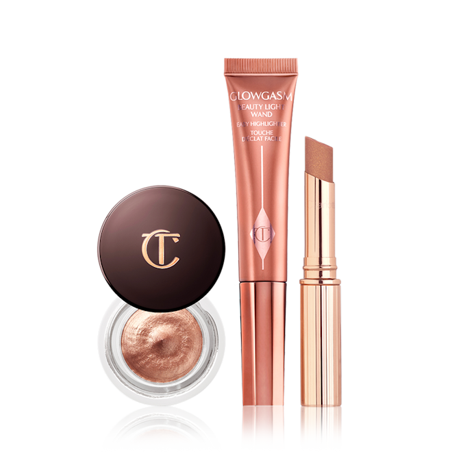 Glitter Galaxy Kit Glitter Galaxy Kit Containing Eyes to mesmerise cream eyeshadow, pillow talk diamonds lipstick and Beauty light wand bronzer.