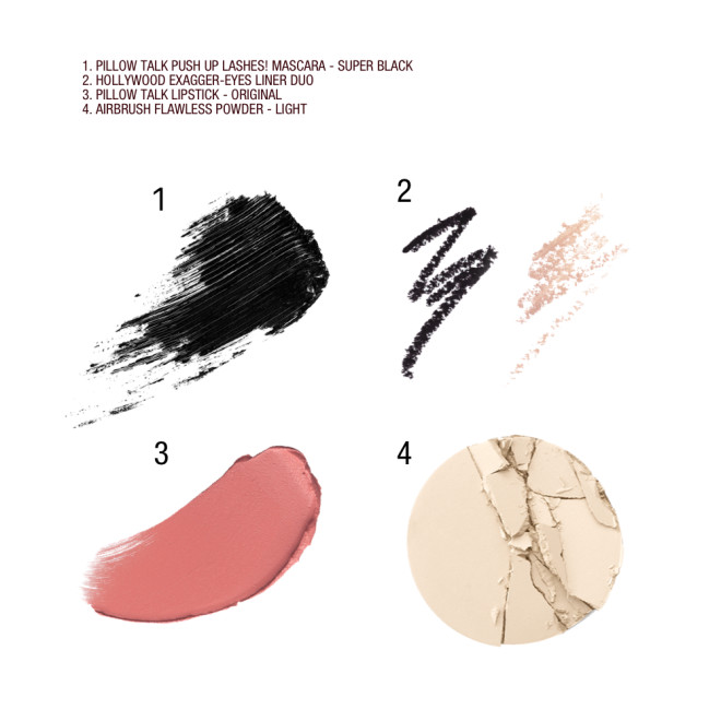 Swatches of black mascara, double-sided eyeliner pencils in black and nude beige, nude pink matte lipstick, and pressed powder compact in a light shade.