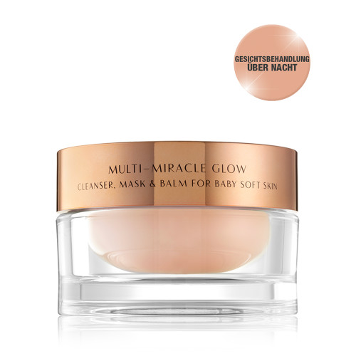 A 3-in-1 face fawn-coloured cleanser, mask, and balm in a glass jar with gold-coloured lid.
