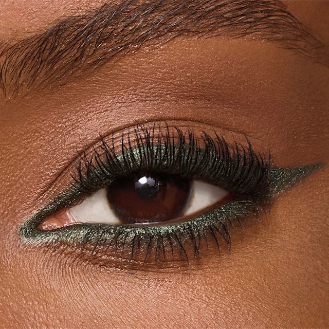 Hypnotic Peacock green eyeliner eye close up