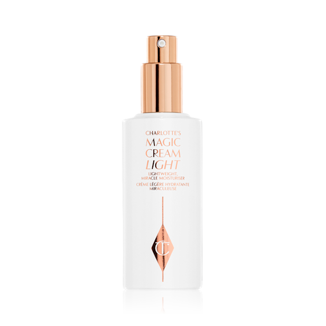 A face cream in a white-coloured bottle with a gold-coloured pump dispenser with the lid removed. 